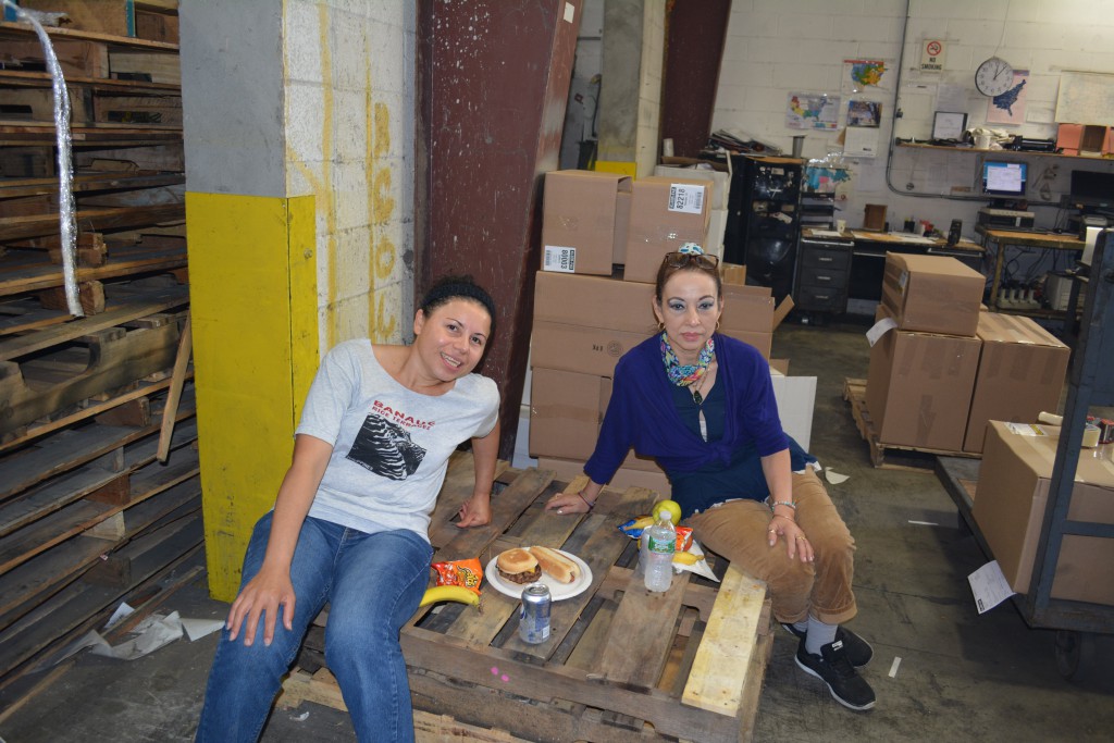 Machine operators, Lillian (15 years) and Leticia (25 years) kick back and relax